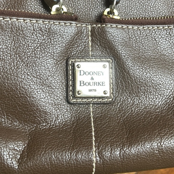 Dooney and Bourke. Brown leather shoulder bag. Has interior stains. - Picture 4 of 14